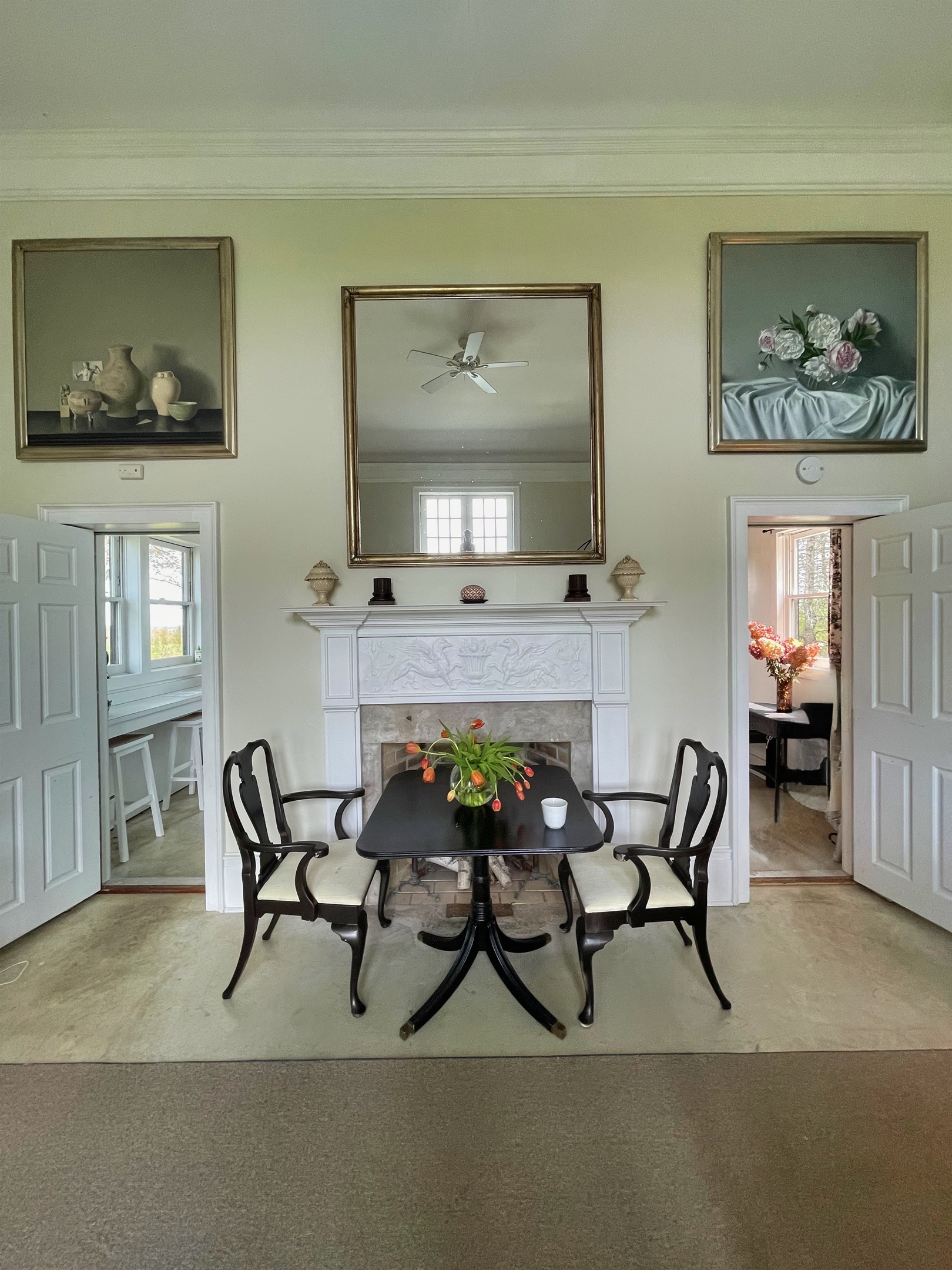 Hawk Field Pool House main space. The door to the kitchen is on the left and the door on the right leads to a sitting area and the full bathroom.