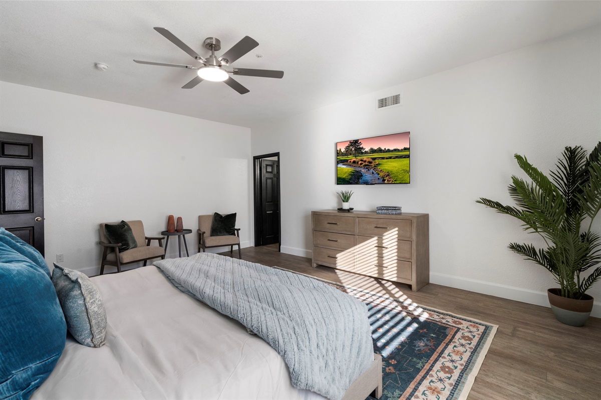55" TV & Ensuite; 2 reading chairs; dresser