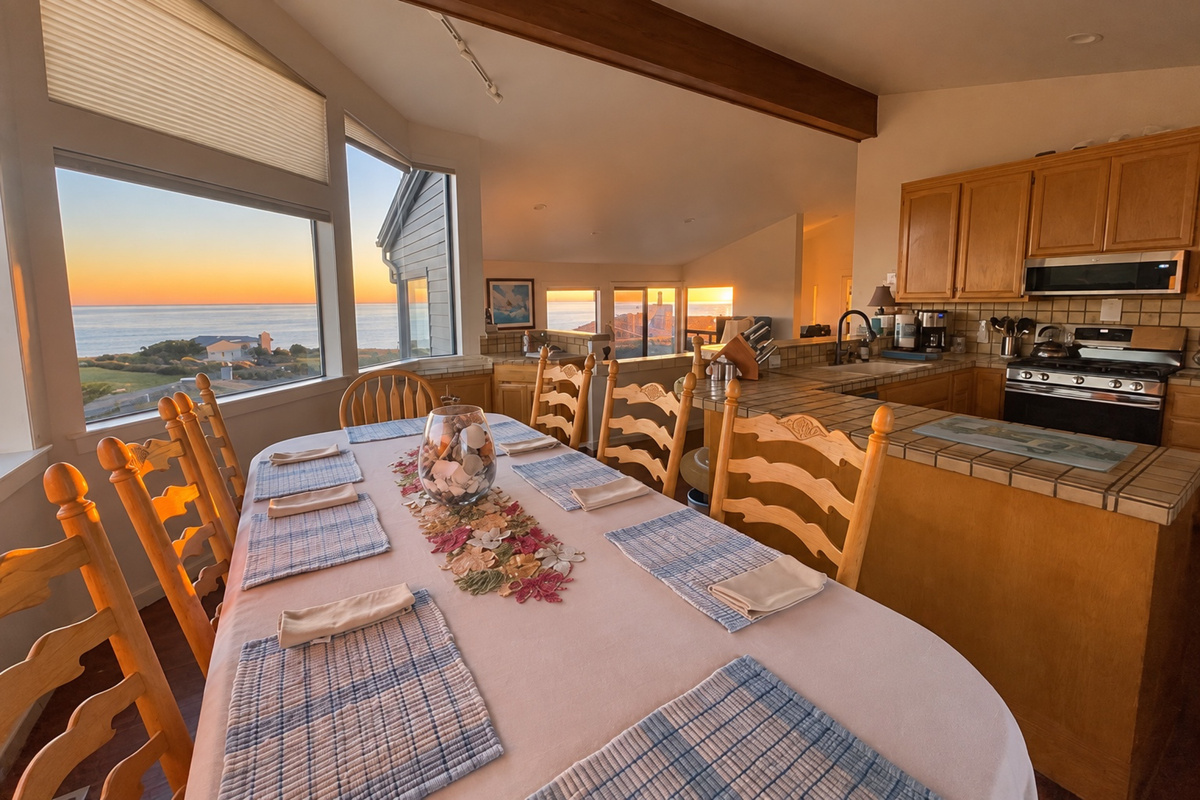Ocean sunset views from dining, kitchen and living rooms