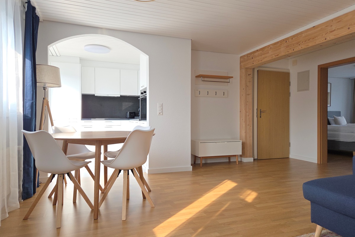 Dining area between kitchen and living room