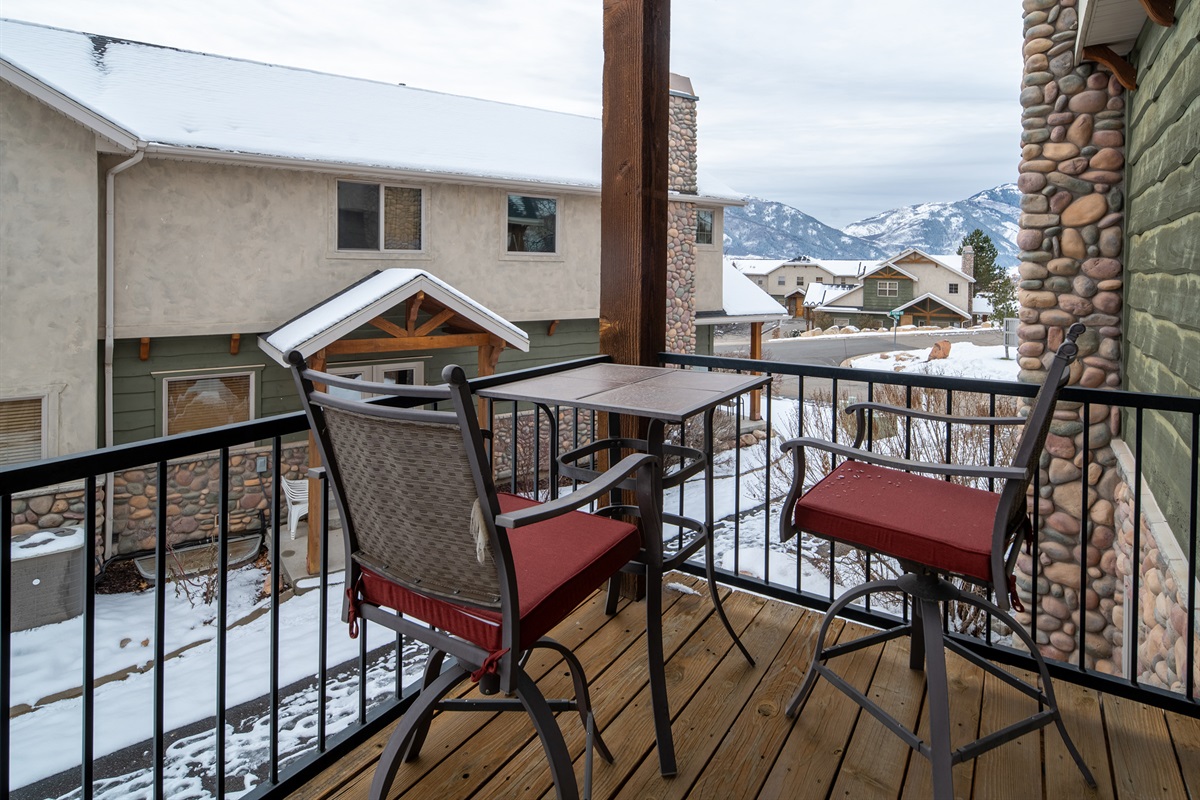 Cozy balcony seating with peaceful winter views