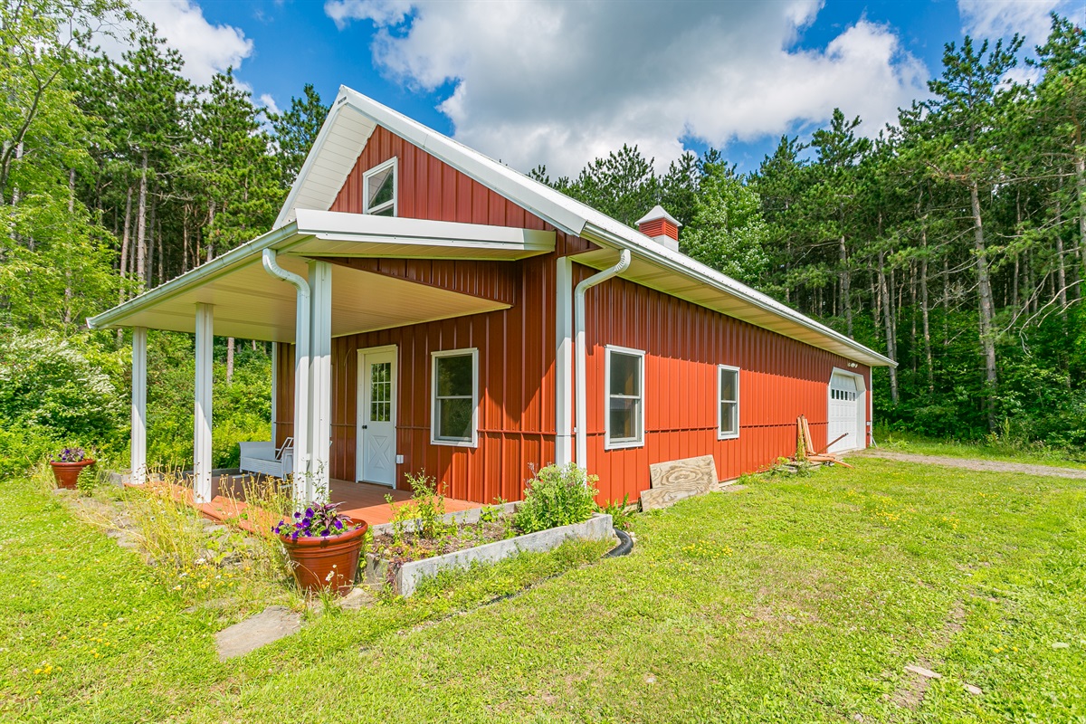 Inviting yoga studio/gym with a welcoming covered porch.