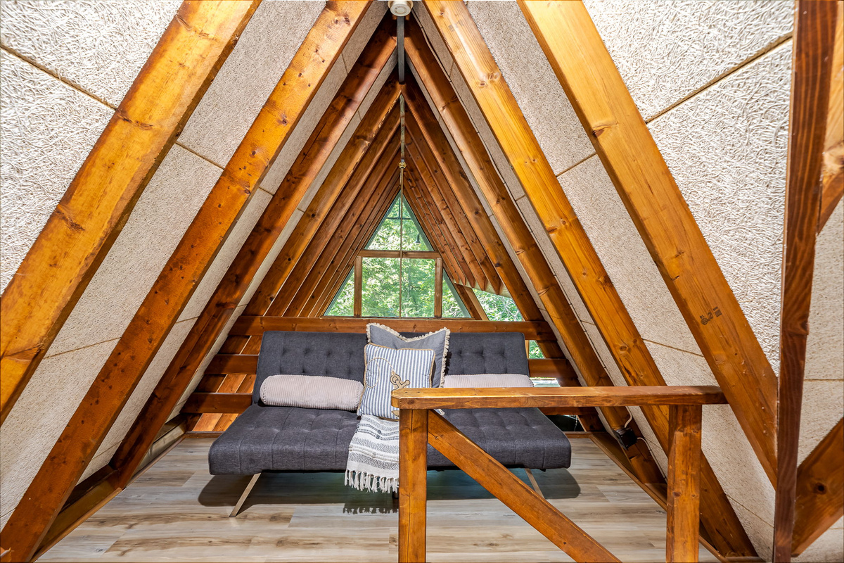 The open air loft is great for hanging out or lower the futon for an additional sleeping spot for one of the kiddos 
