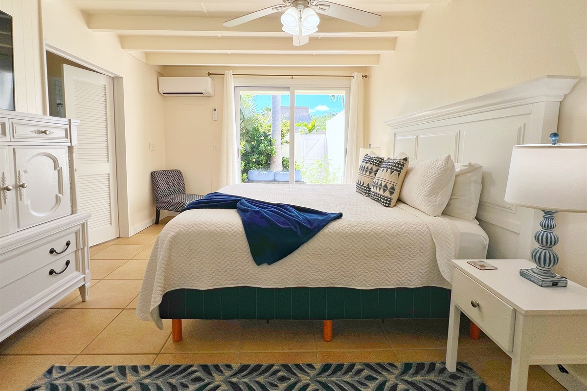 Wake up to natural light streaming through floor-to-ceiling glass doors in every bedroom.