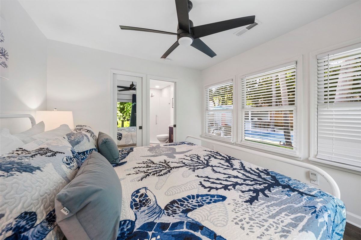 King Bedroom 3 Overlooks The Pool and Has a Private Entrance To Backyard | IOP Escapes Beach Blessing | 3705 Hartnett Blvd, Isle of Palms, SC