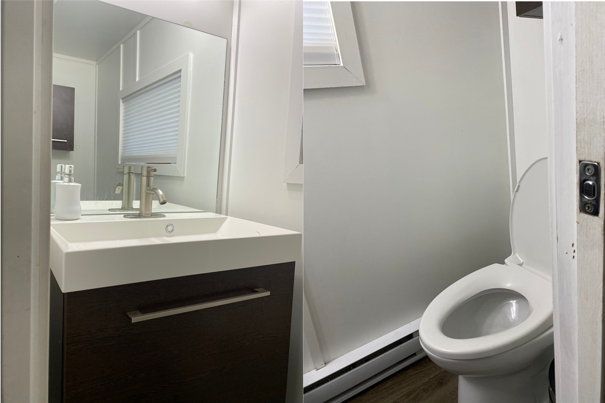 Downstairs powder room with sink and toilet
