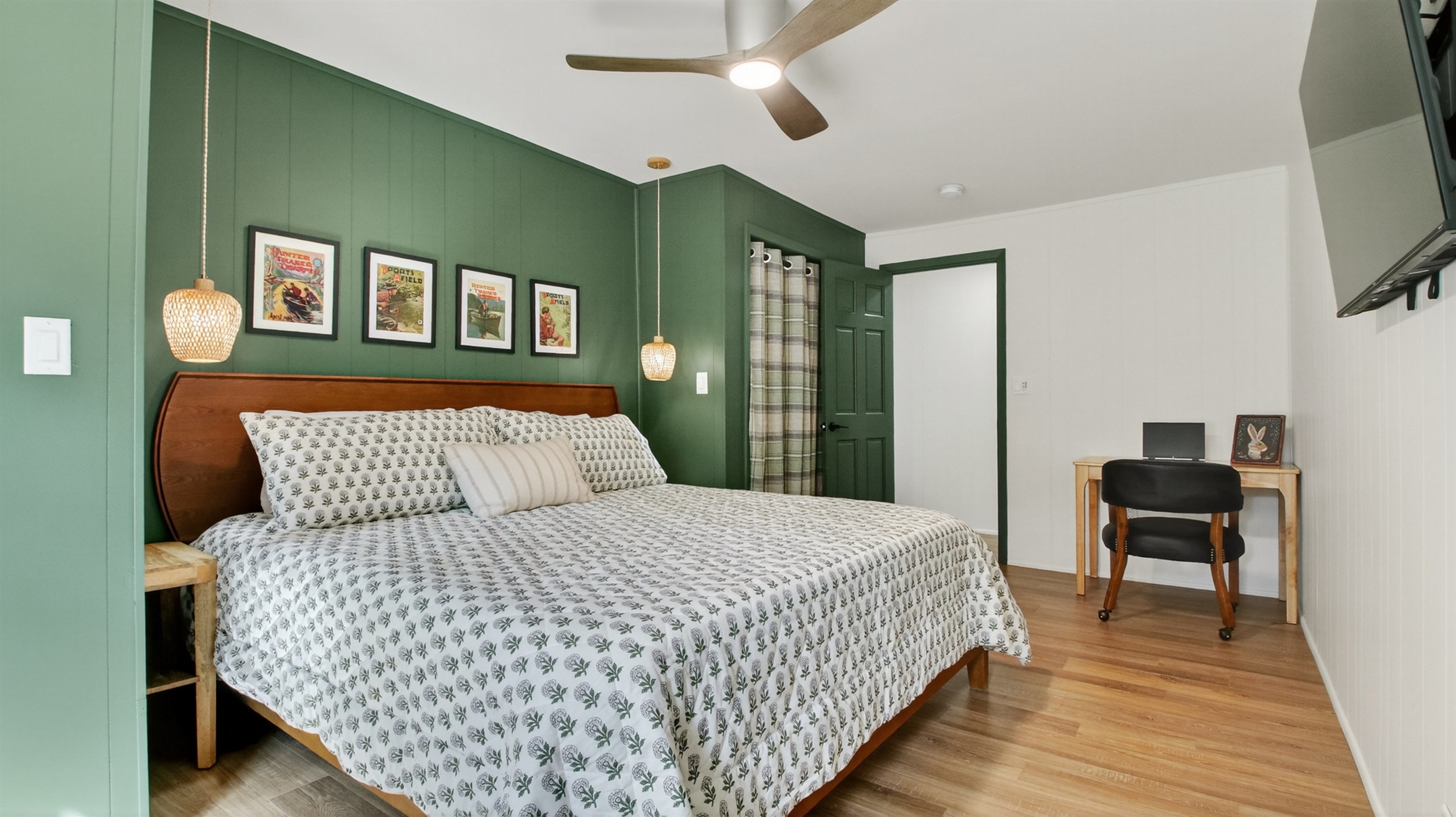 Catch up with the office if needed. This bedroom has a king bed, closet for clothing storage, and desk and office chair.