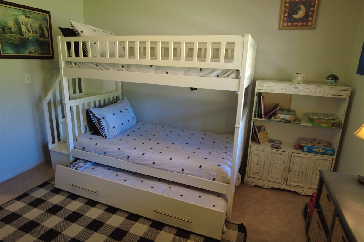 Bunk with trundle (sleeps 3) can sleep adults upper two levels