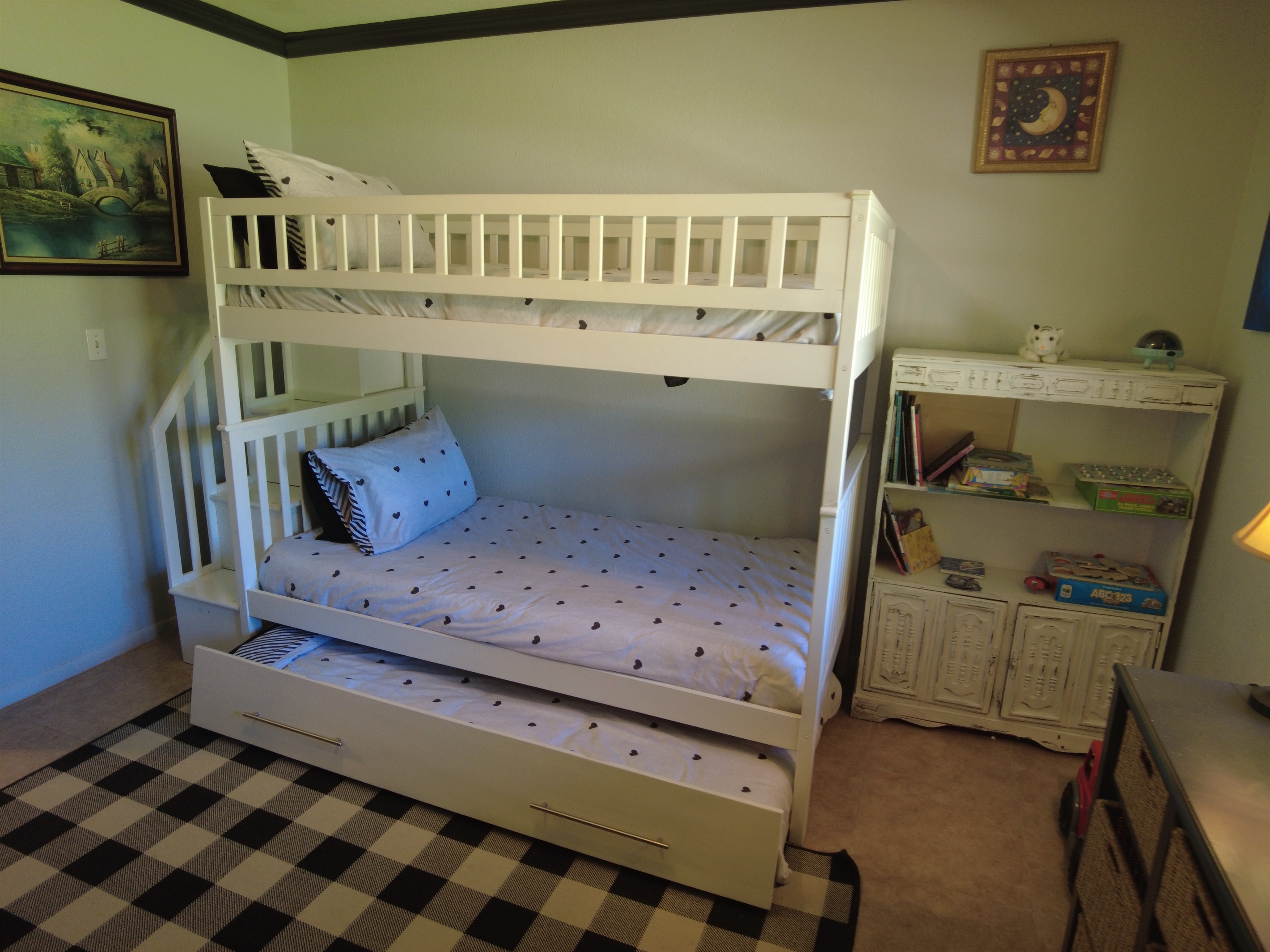 Bunk with trundle (sleeps 3) can sleep adults upper two levels