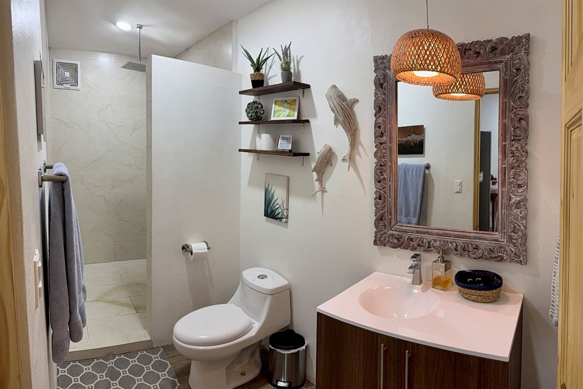 Newly renovated bathroom with large rain shower. 