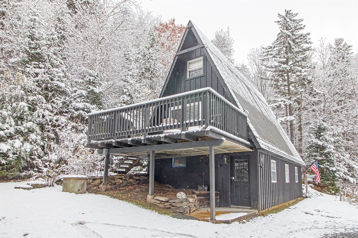 Front door view with second floor deck