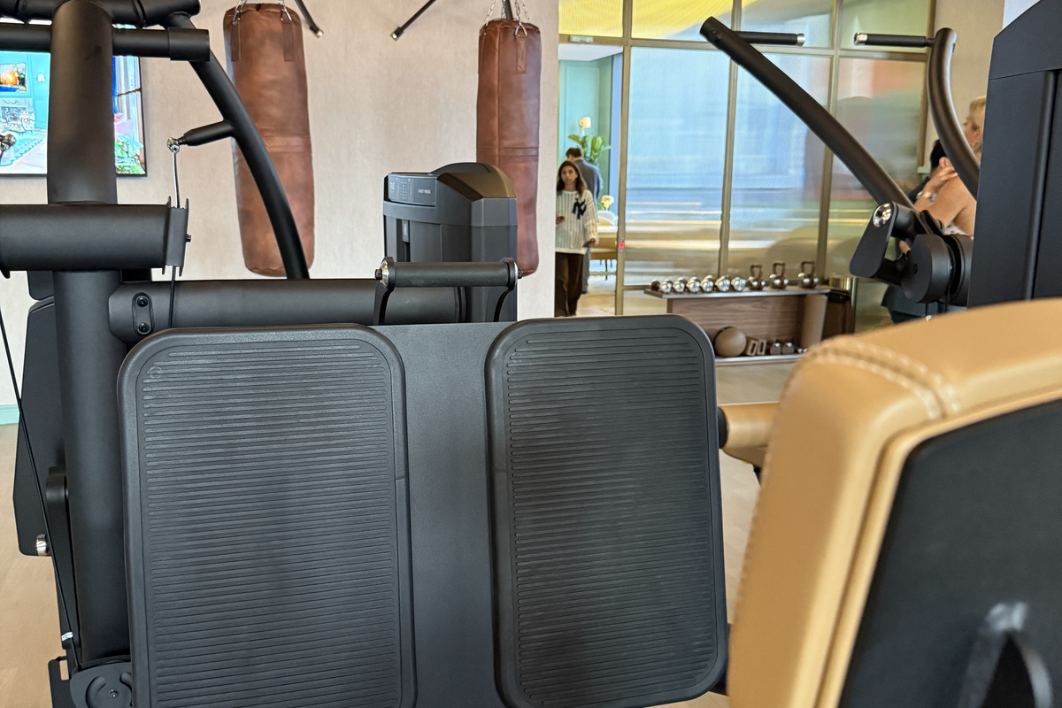 Train with a view - cardio and strength beside floor-to-ceiling glass.