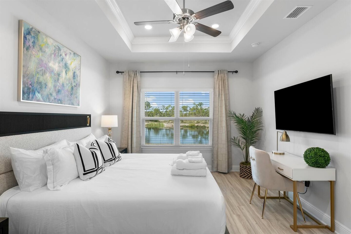 A thoughtfully designed bedroom combining relaxation, productivity, and cozy lighting.