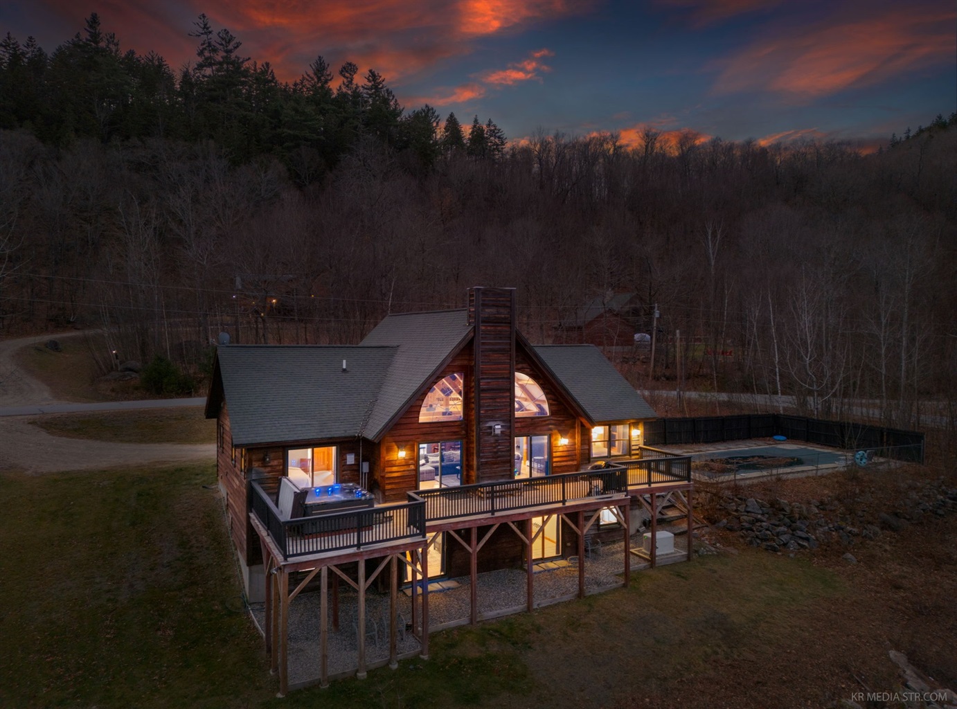 Escape to this stunning mountain cabin with glowing interiors, peaceful surroundings, and total privacy where your whole group can spread out and settle in for a true getaway.