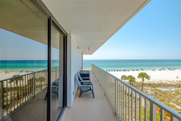 Wrap balcony accessible from two master bedrooms