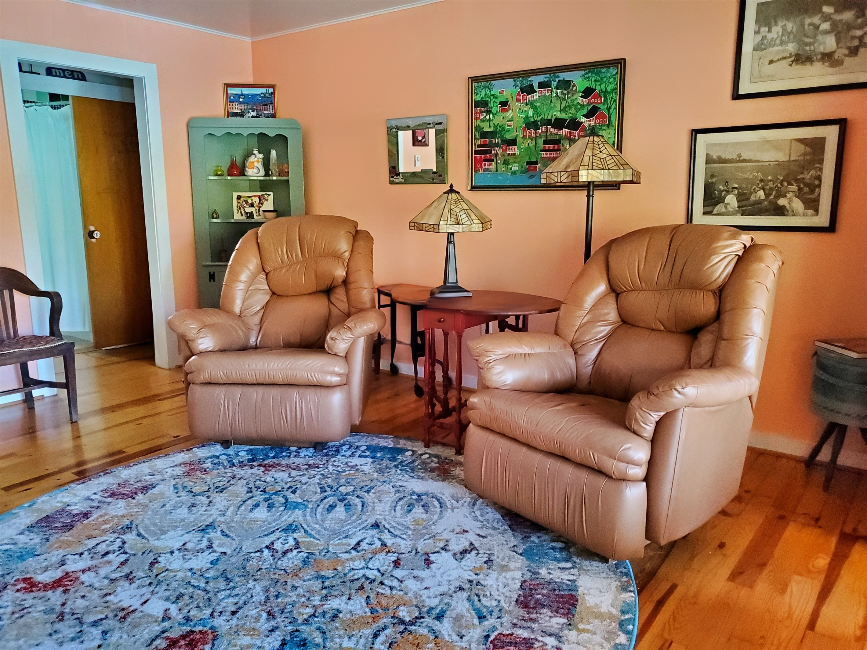 Big Pines living room with recliners for watching Tv or the beautiful view.