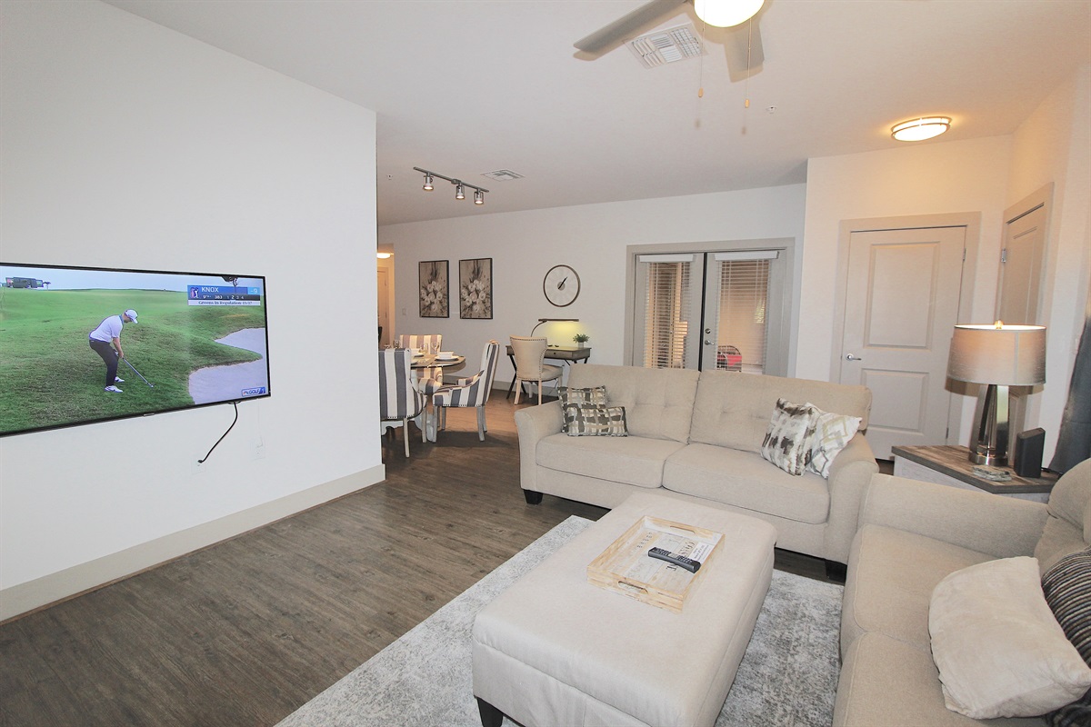 Living area with 50in flatscreen TV