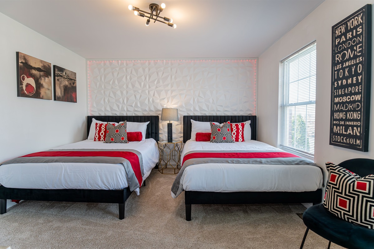 The fourth bedroom features two full beds &ndash; great for kids, friends, or extended family.
