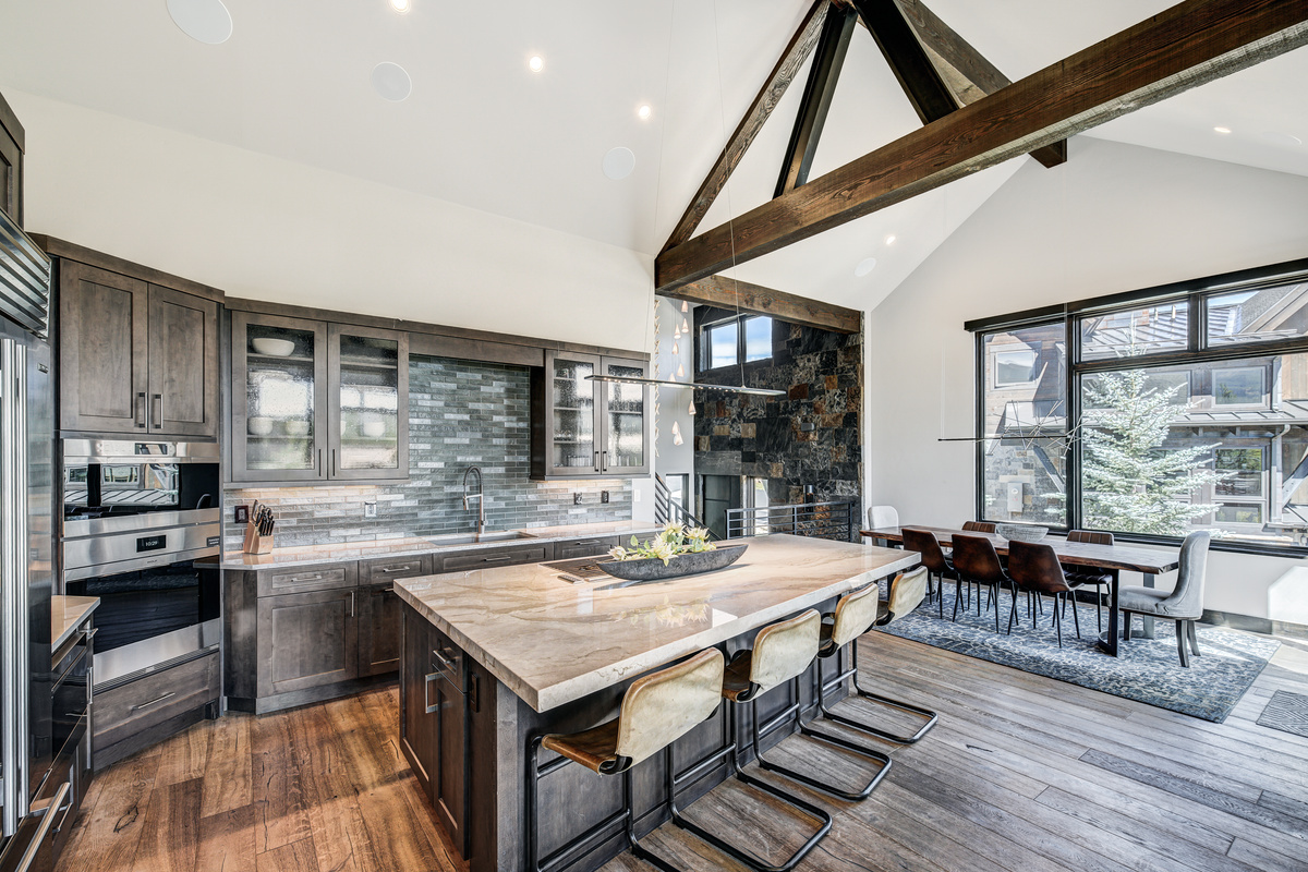 Kitchen with open floor plan to dining room and living room.