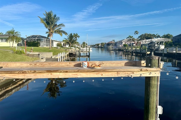Dock table is perfect for a morning cup of coffee and a croissant from a local bakery