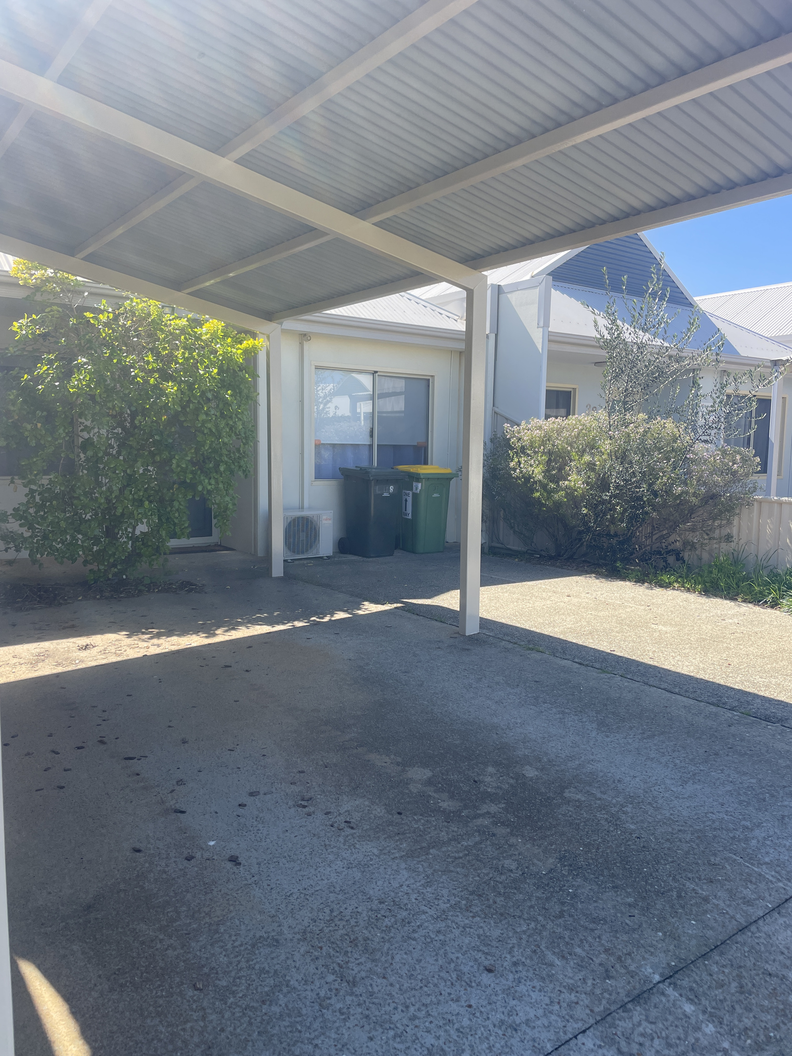 Single Carport (inside of Complex) with extra space for trailer