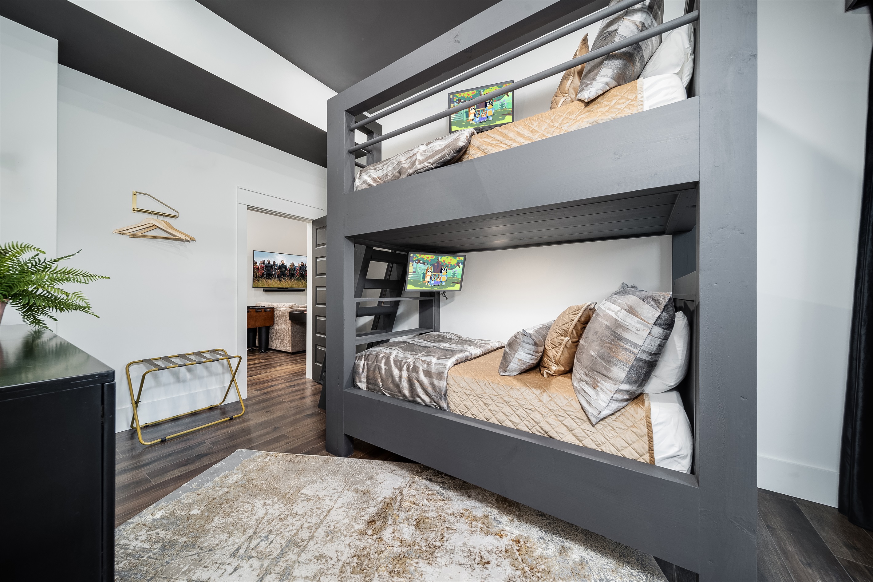 A cozy twin-over-twin bunk bed setup, perfect for kids or the young at heart seeking a fun, shared retreat!