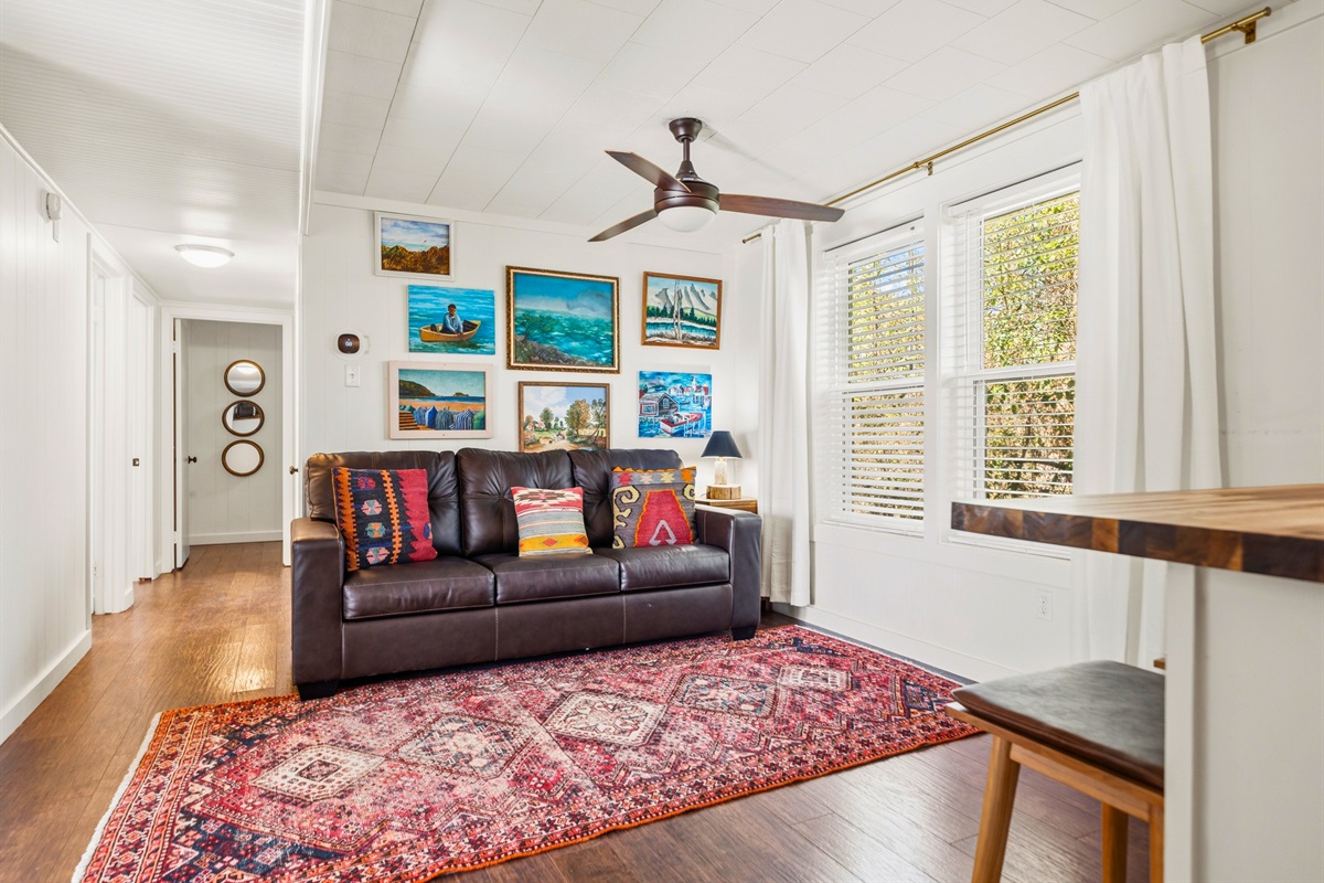 Enjoy another view of the guest house interior where the open layout and cozy furnishings make it easy to settle in and feel at home.