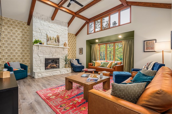 A bright, welcoming living room perfect for family time, fire-side chats, and unwinding after a day of adventure.