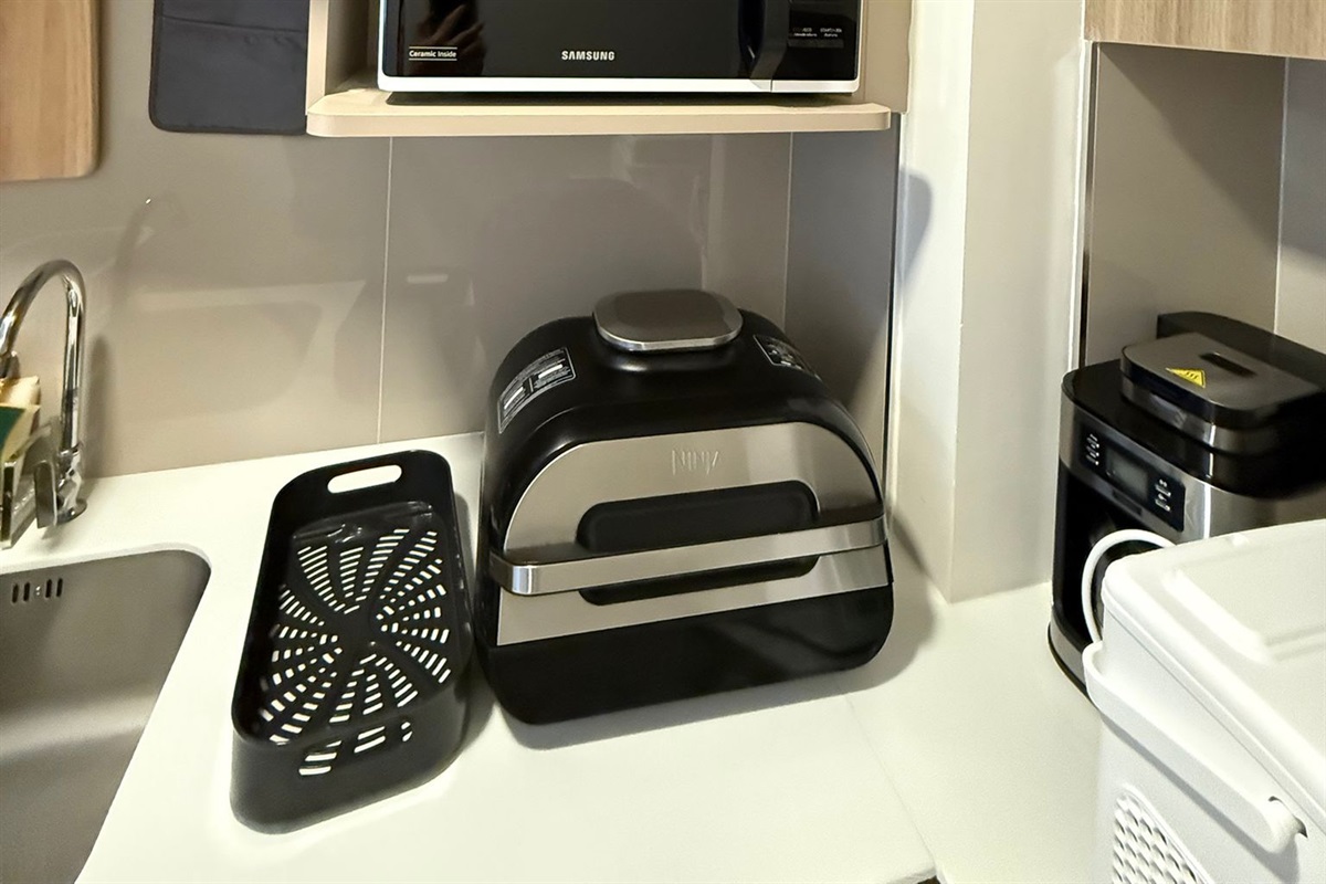 The Ninja® Foodi® Smart XL Grill that sears, sizzles, and air fry crisps.
