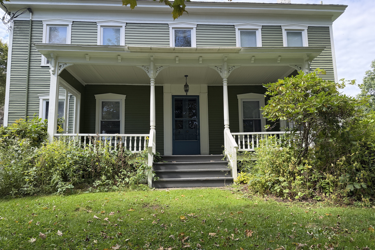 The Federal House classic front porch.