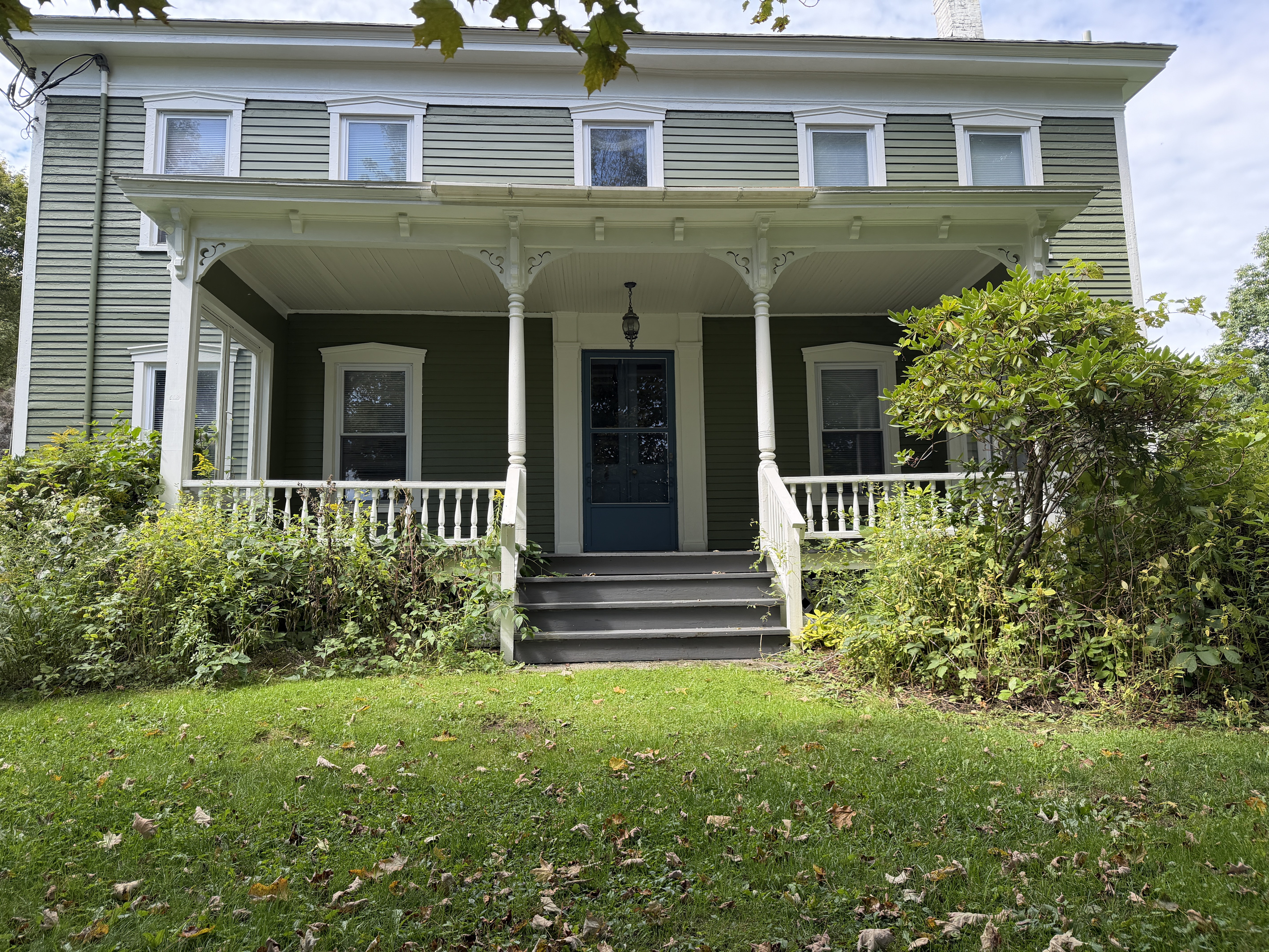 The Federal House classic front porch.