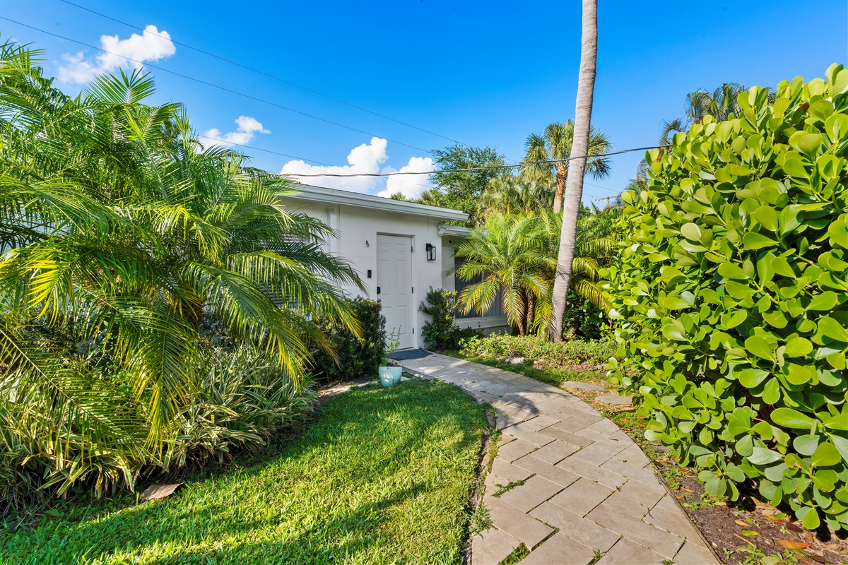 Private tropical pathway leading to your peaceful cottage retreat 🌴