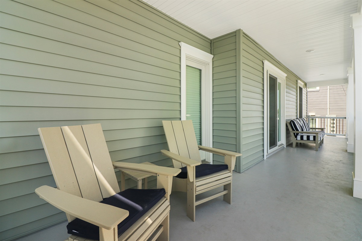 Wide balcony area with outdoor seating