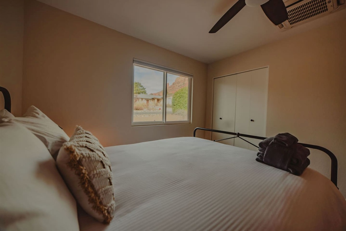 Soft linens and cozy touches for a restful night’s sleep