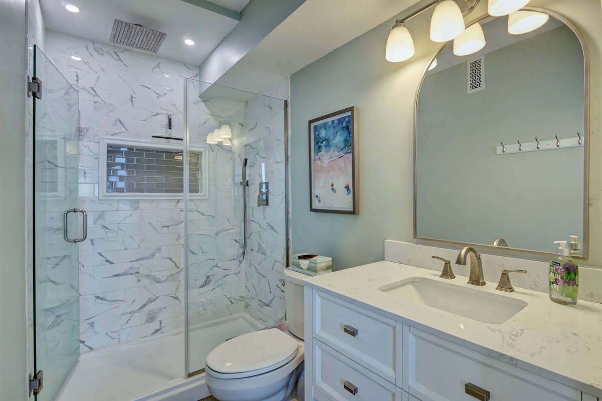 Ensuite bathroom with beautiful rainfall shower & handheld