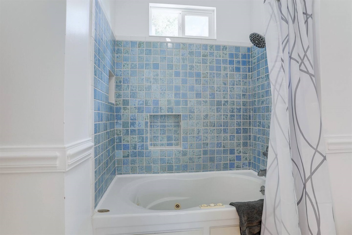 Indulge in the primary bath, a relaxing retreat with modern fixtures and plenty of space to refresh and unwind.