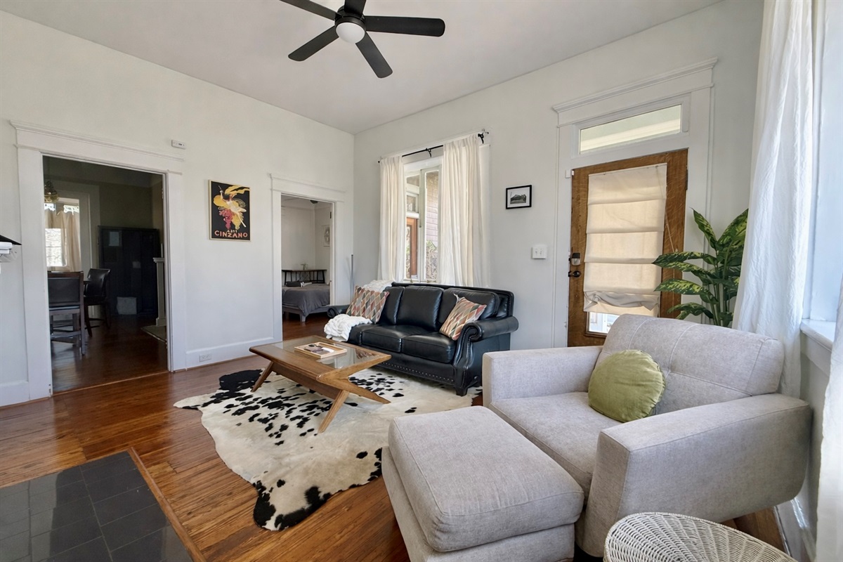 The living room is so comfortable, come checkout our leather sleeper sofa!