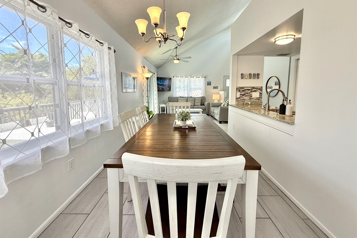 Sunlight streams through the windows, creating a cheerful dining area where every meal feels special.
