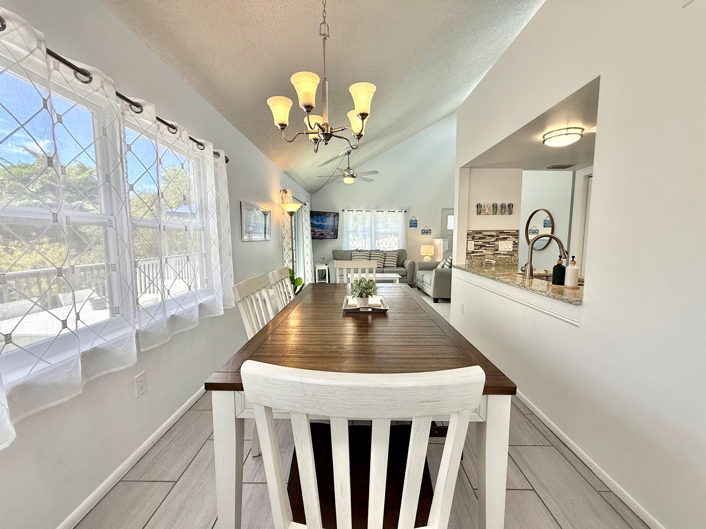 Sunlight streams through the windows, creating a cheerful dining area where every meal feels special.