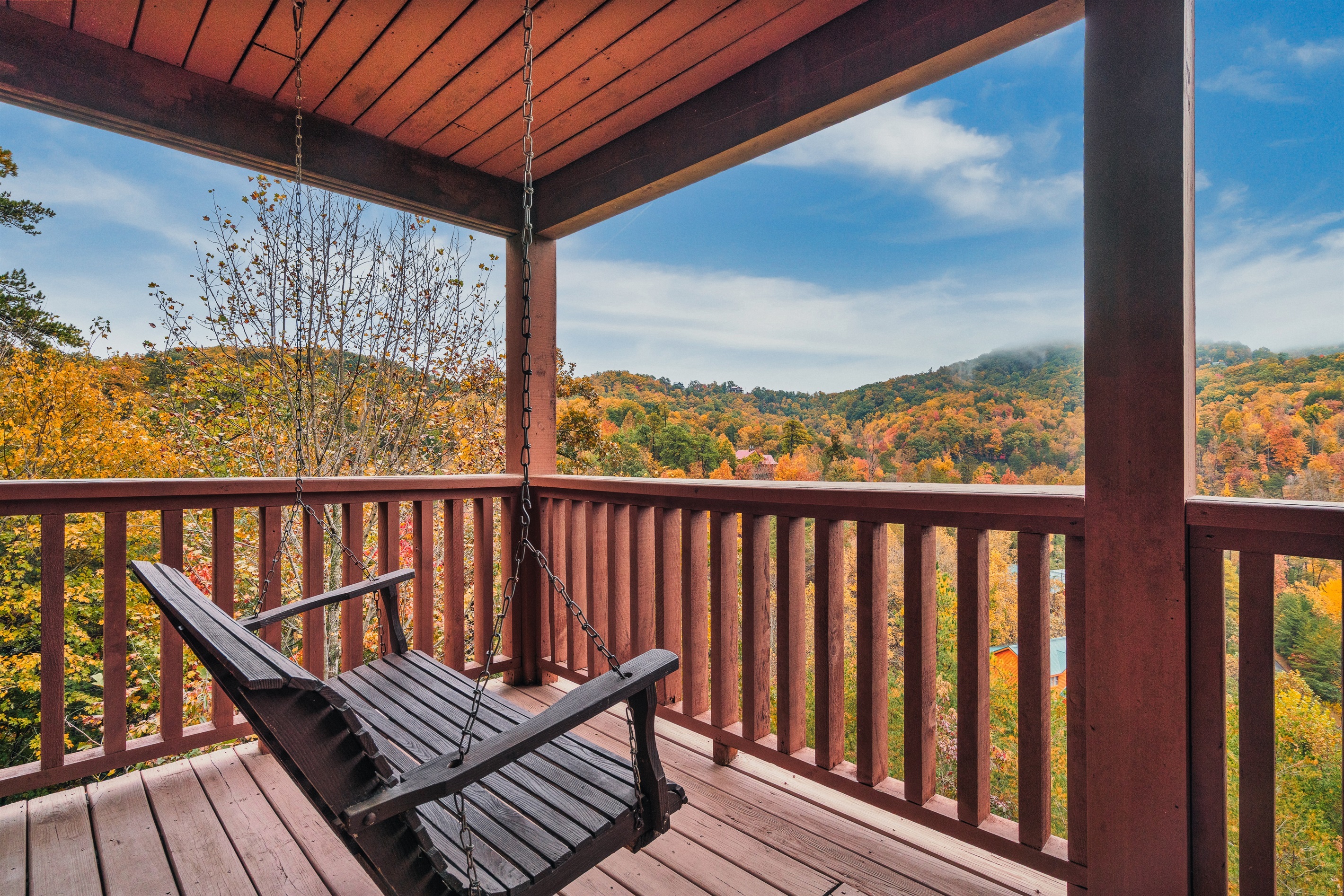 Sip your morning coffee or unwind in the evening on your private deck, surrounded by vibrant fall colors and cozy seating.