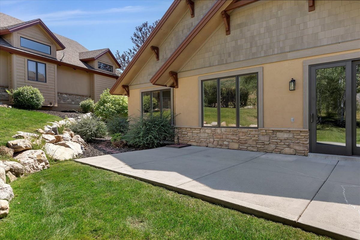 Step outside to a private patio space—perfect for enjoying fresh air and relaxed outdoor moments.