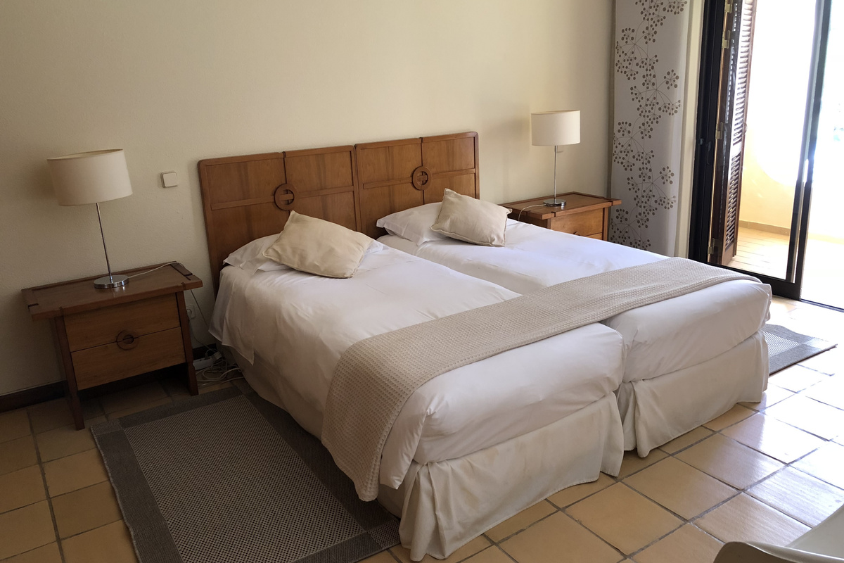 Casa do Prado Bedroom Style
Hotel quality mattresses. Choose between a king bed or twin singles.
The windows open onto a balcony overlooking the front garden.