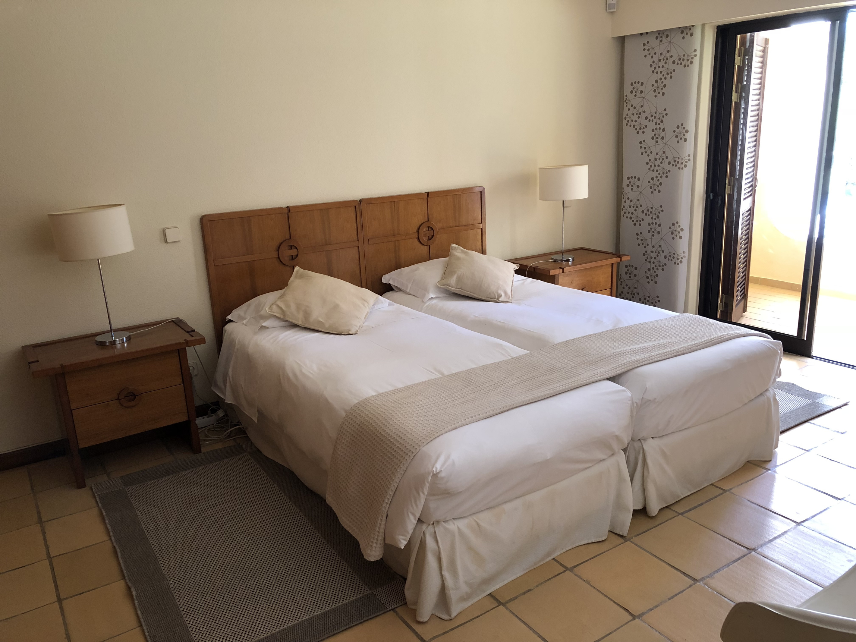 Casa do Prado Bedroom Style
Hotel quality mattresses. Choose between a king bed or twin singles.
The windows open onto a balcony overlooking the front garden.