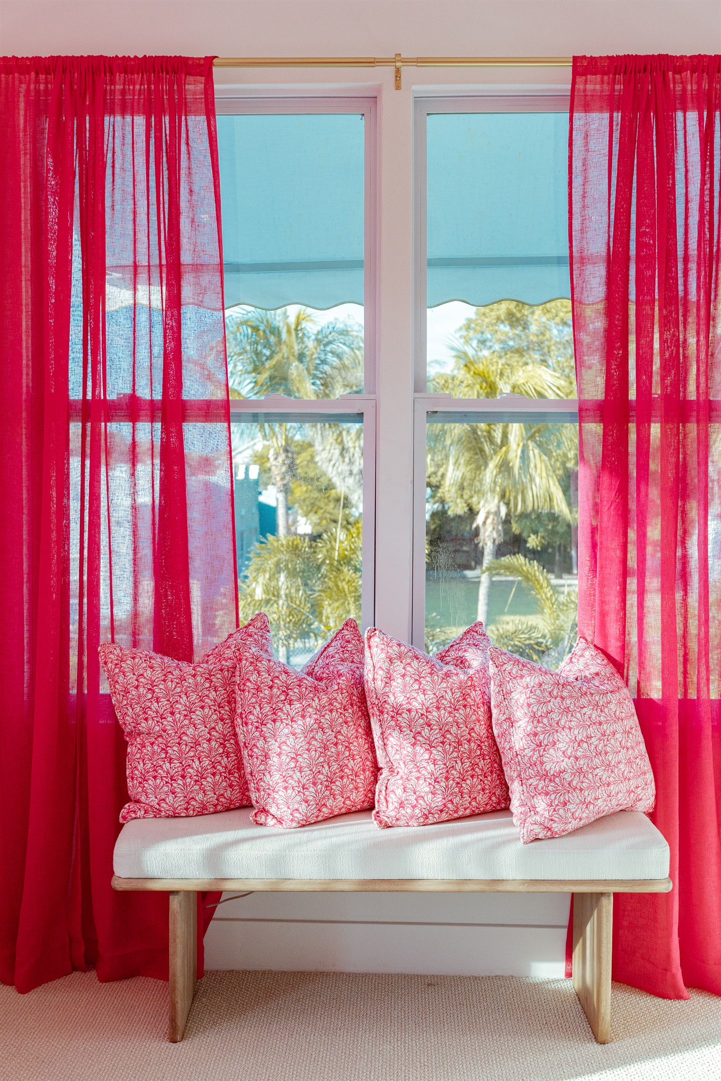 The third bedroom has themes of Palm Beach in pink and red, a stylish and fun way to be immersed in the local culture.