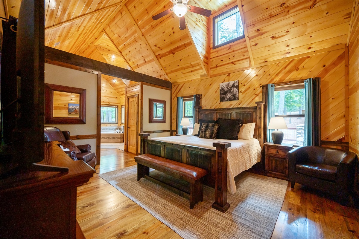 Master suite features a king bed and sits off the back deck and main living.