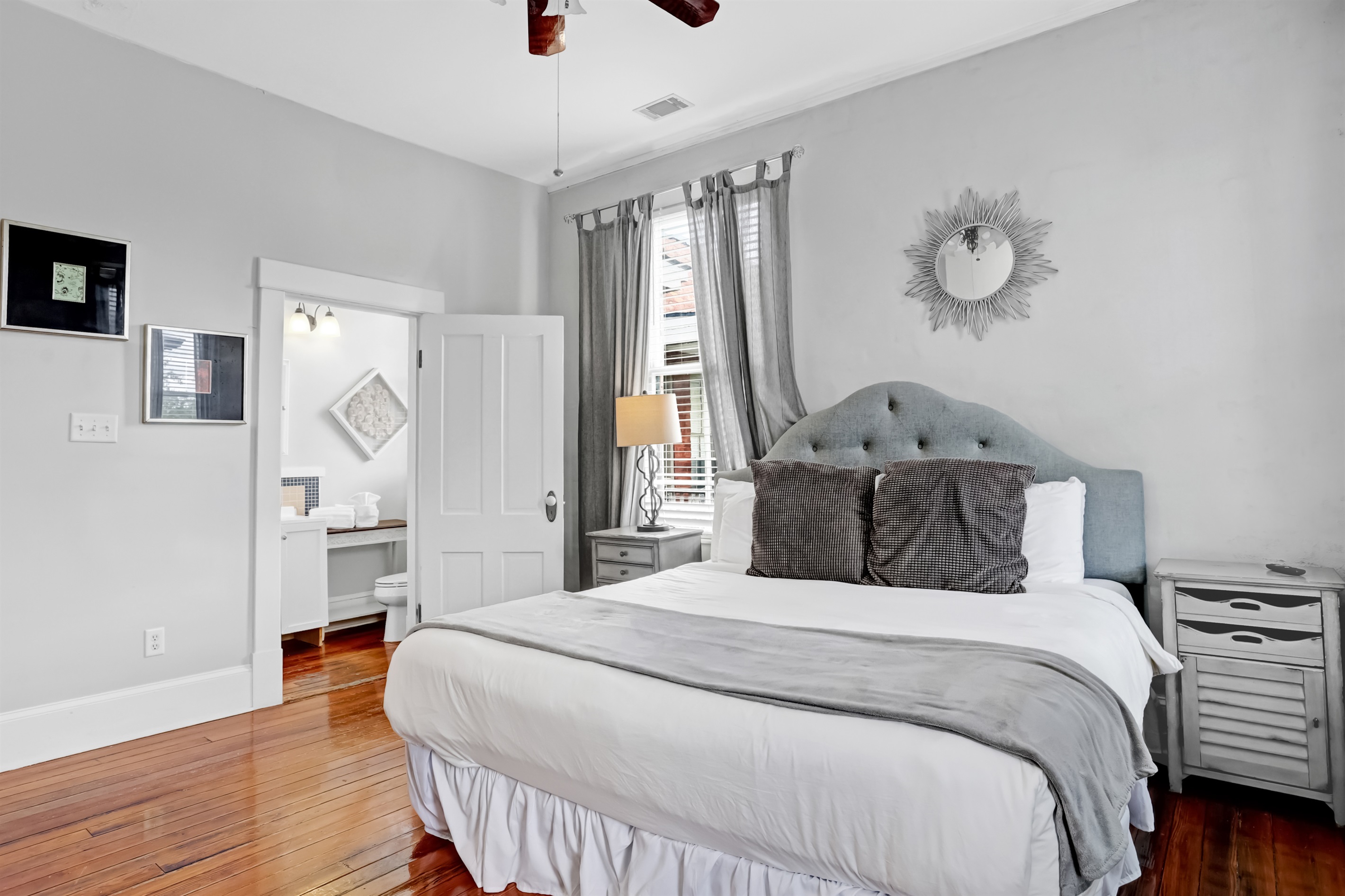 Spacious primary bedroom with a luxurious king bed for ultimate comfort.