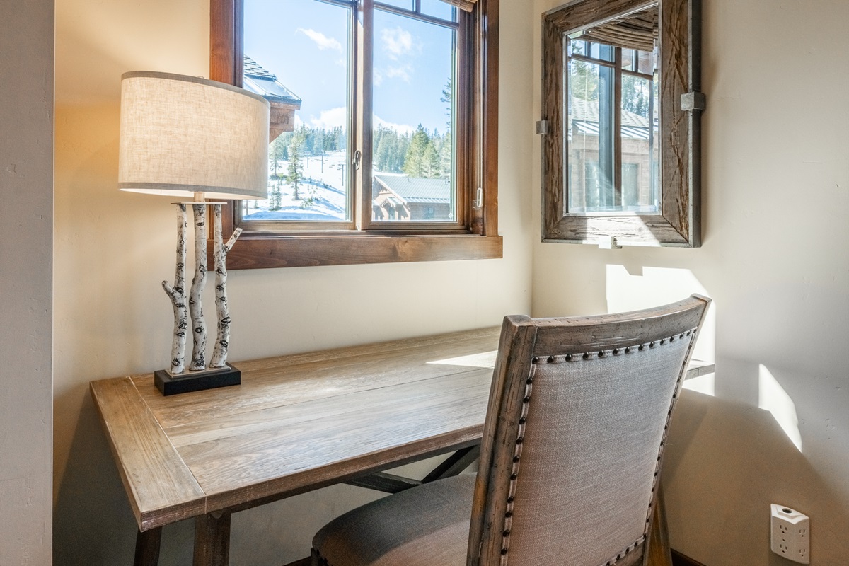 Work with a view—this cozy workspace overlooks Canyon Lodge’s ski runs, perfect for answering a few emails before heading out to the lifts.