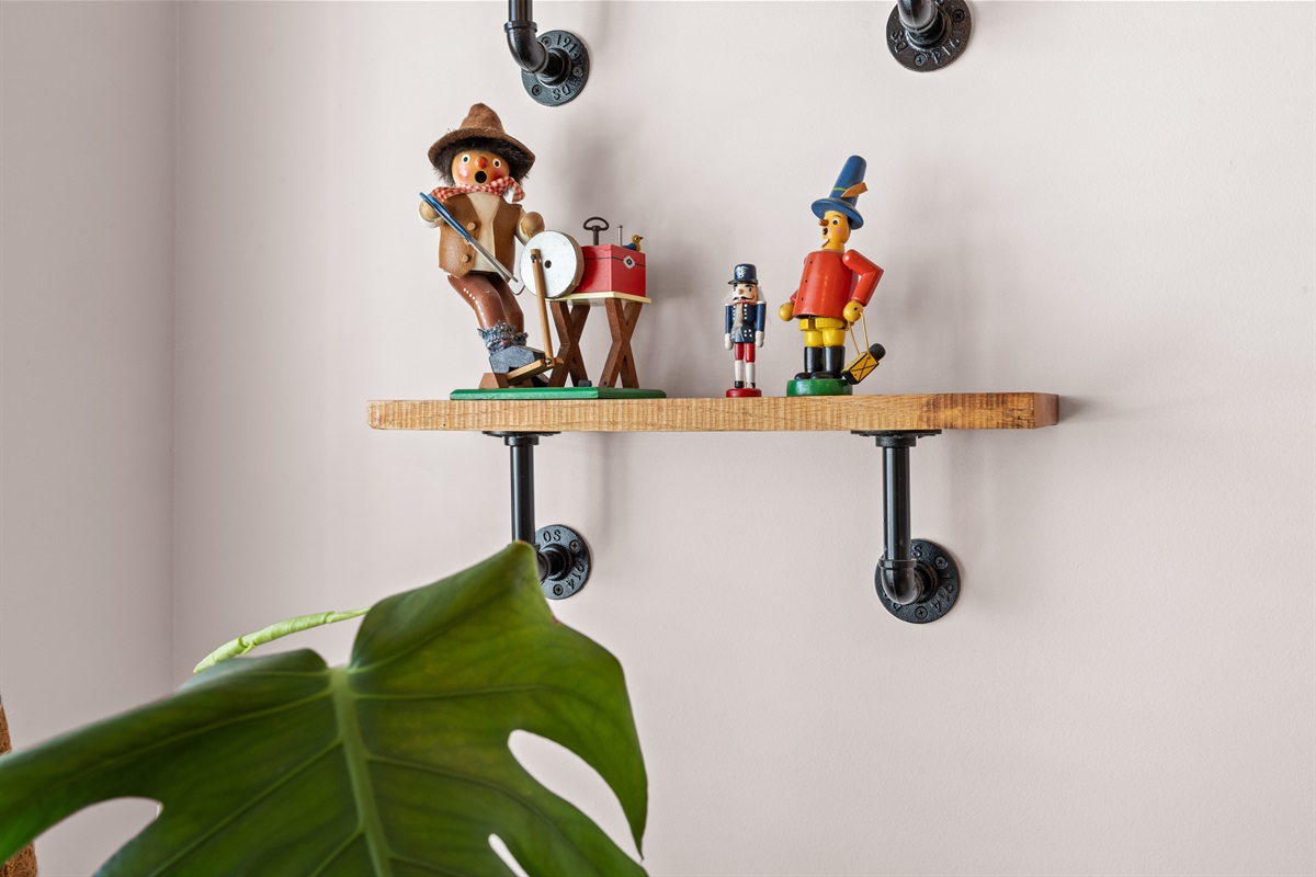Whimsical decorative shelf adding charm and personality to the home.