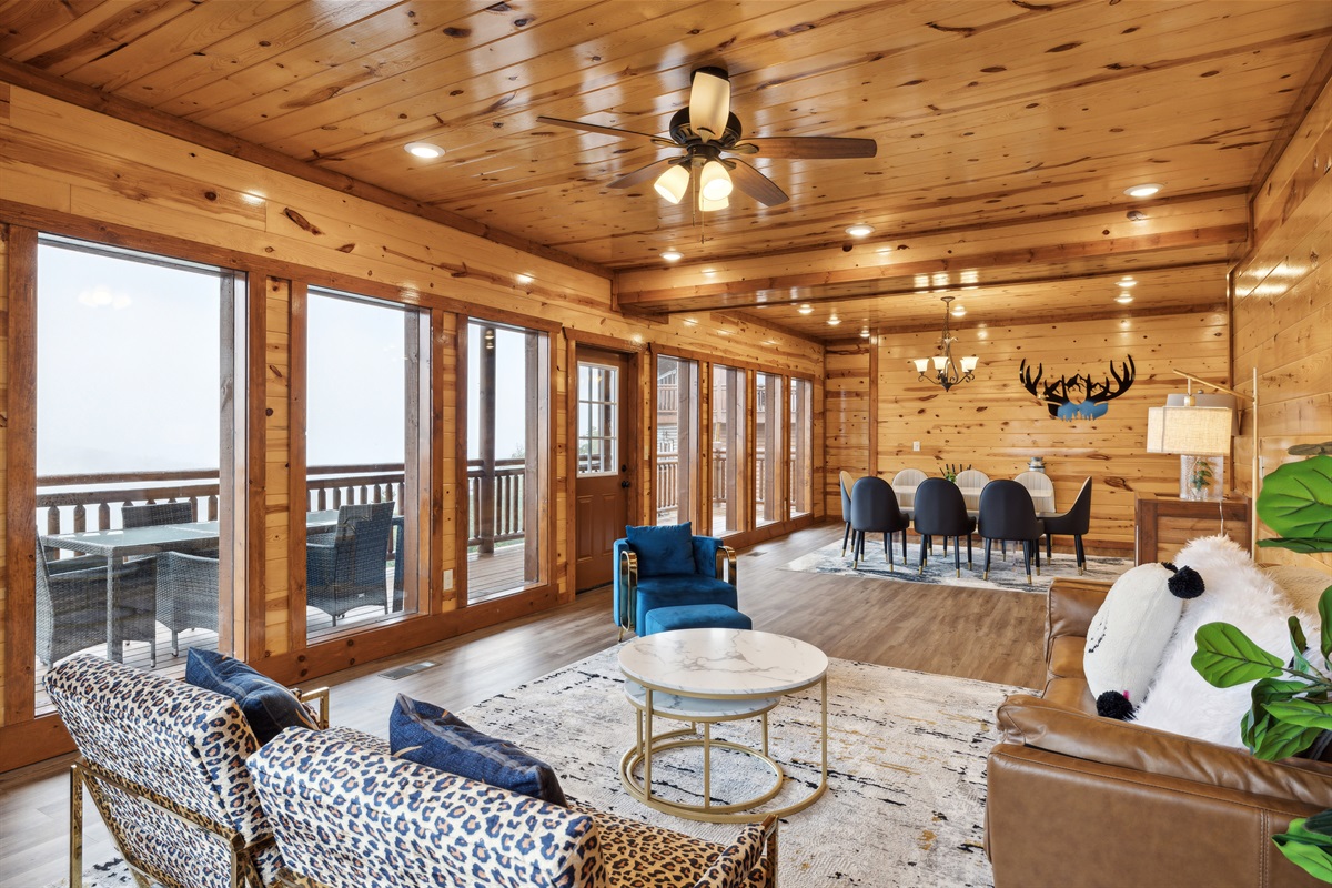 Main level living area featuring a fireplace and TV