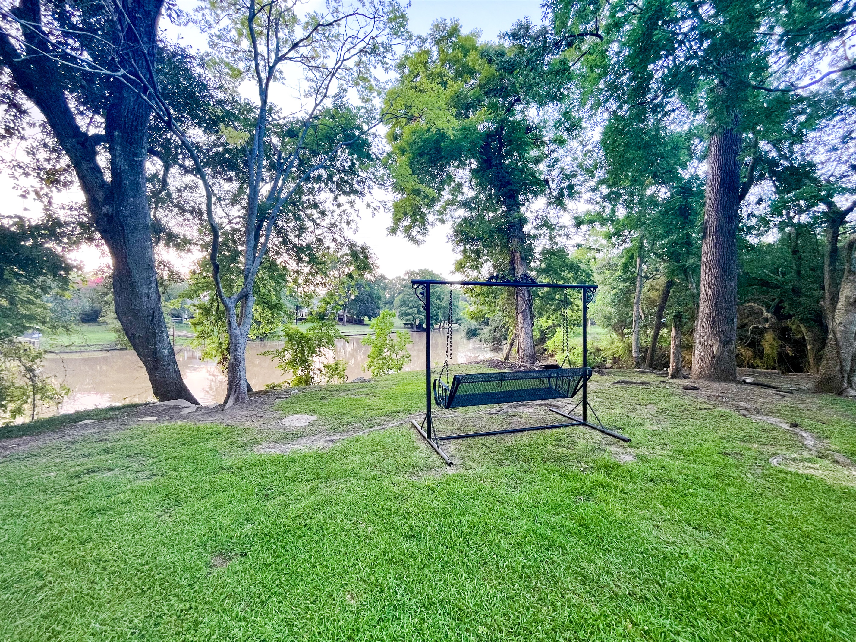A wrought iron swing that provides amazing views of the Vermilion Bayou